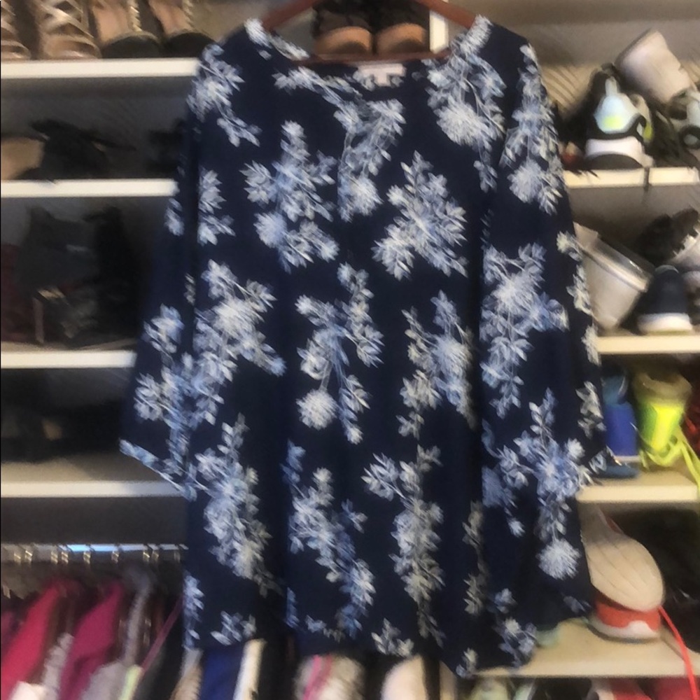 WOMAN WITHIN FLORAL SHIRT. NEVER WORN